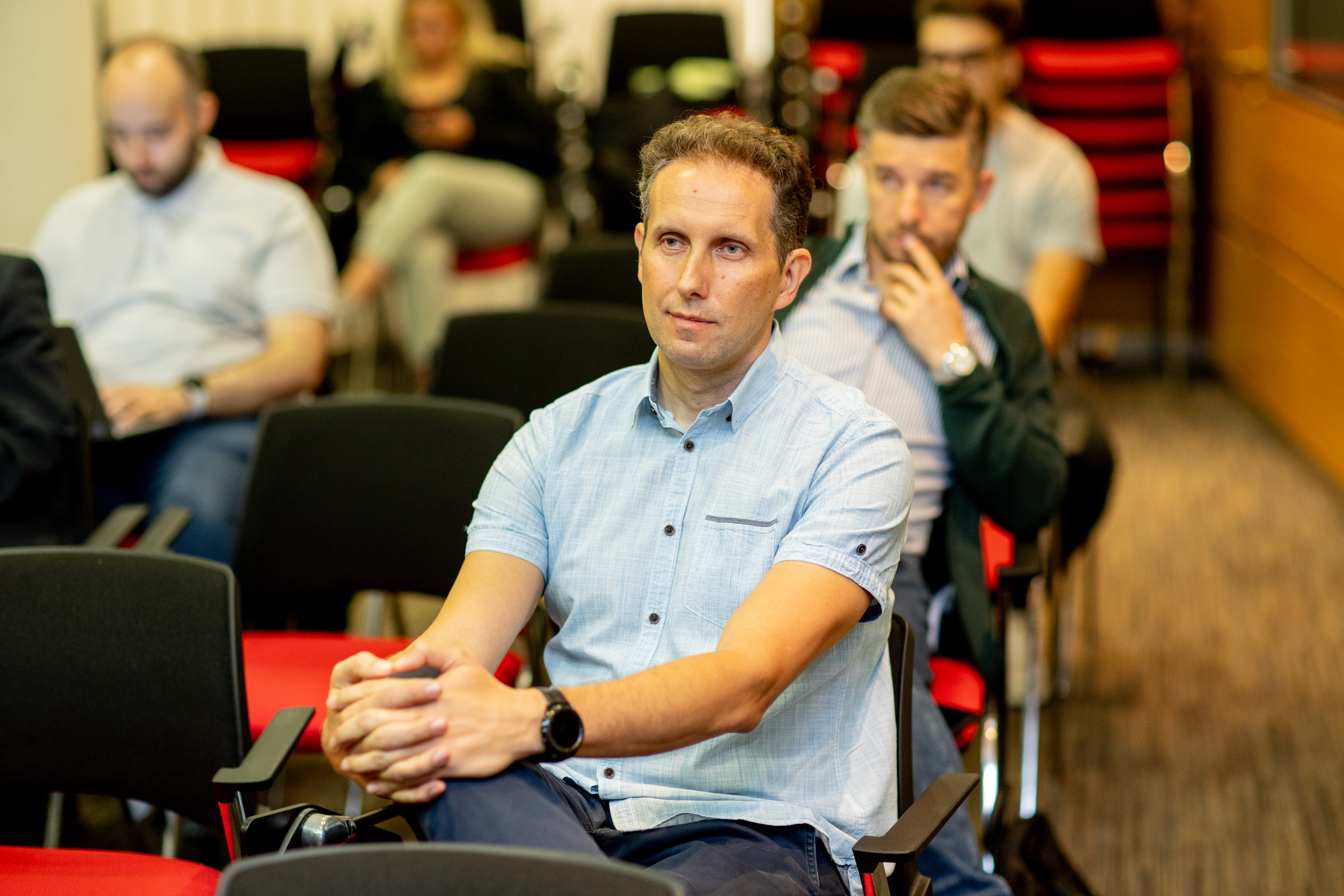 Participants working hands-on with AI datasets and workflows